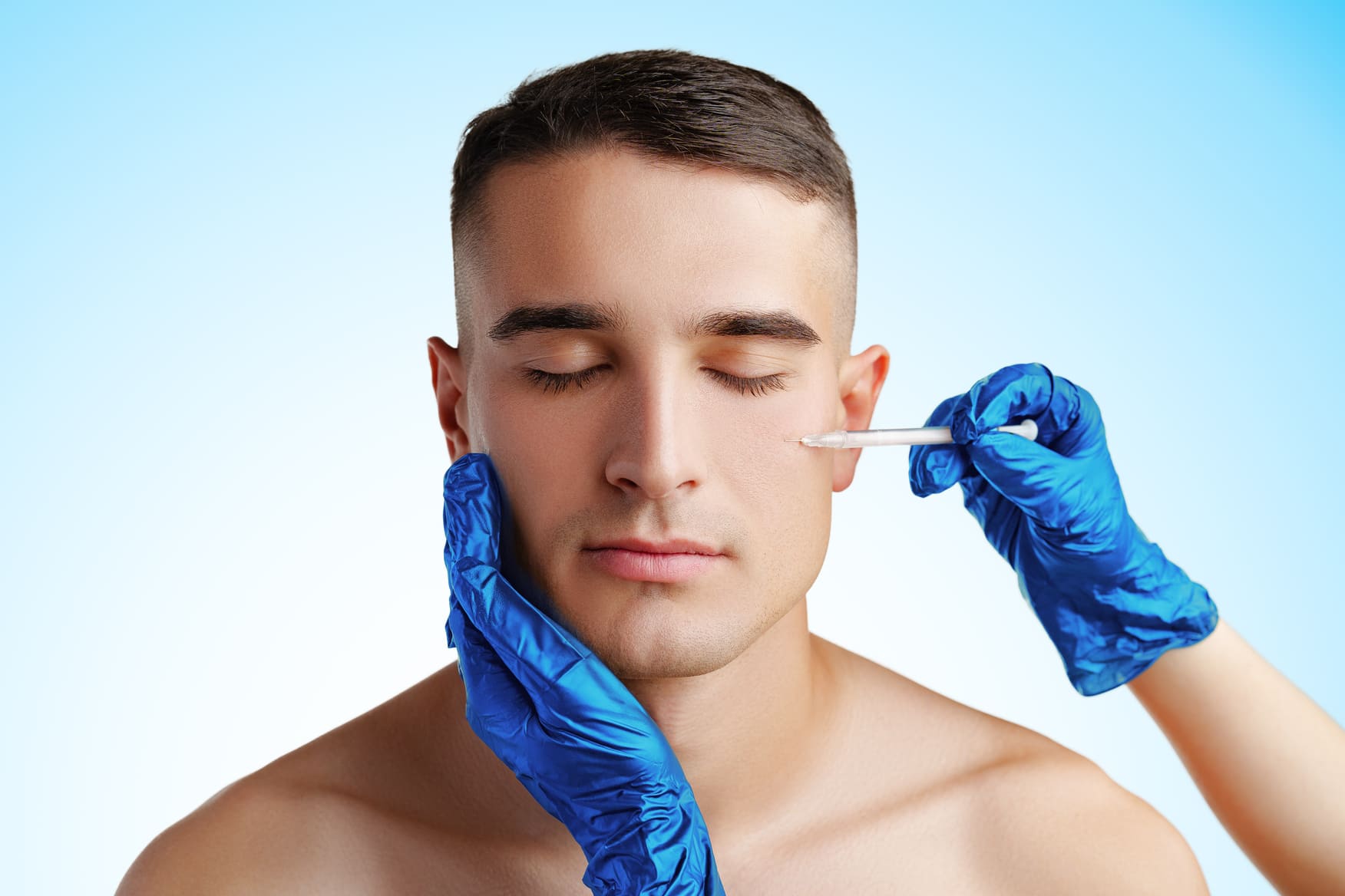 handsome-young-man-face-and-beautician-hands-with-2024-02-14-16-58-47-utc (1) (1)