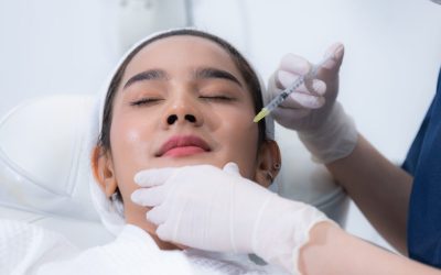 young Asian woman making cosmetology treatment skin injection, Mesotherapy of face beauty care